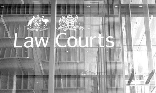 Sydney, Australia - October 26, 2013: The Front window of the Law Courts in Australia, with the coat of arms of Australia.