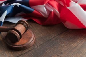judge gavel with flag