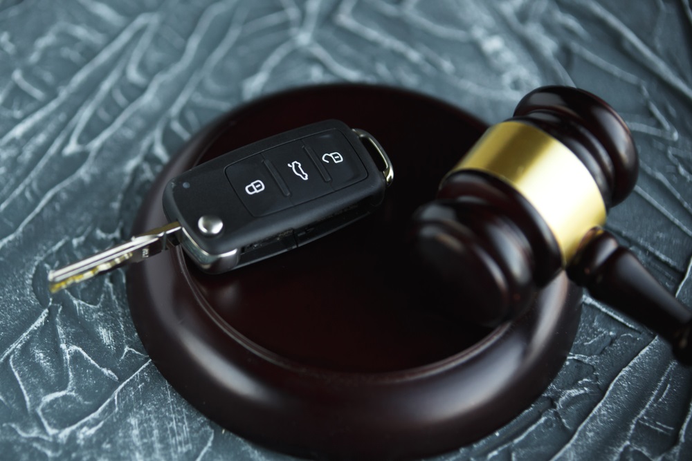 gavel and car key