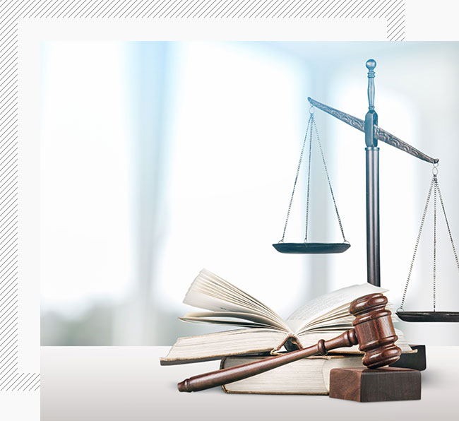 Legal scales, 2 books and gavel representing law and the legal system