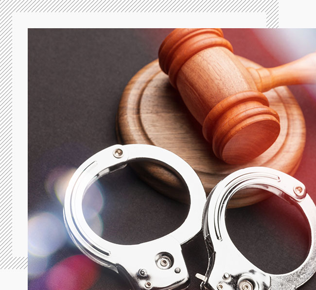 handcuffs and gavel symbolising the legal system