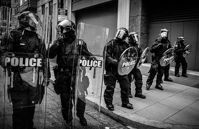 photo of police using shields