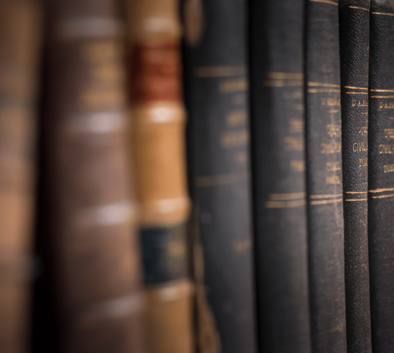 Old legal books representing hearsay evidence rules and exceptions in Australian criminal law