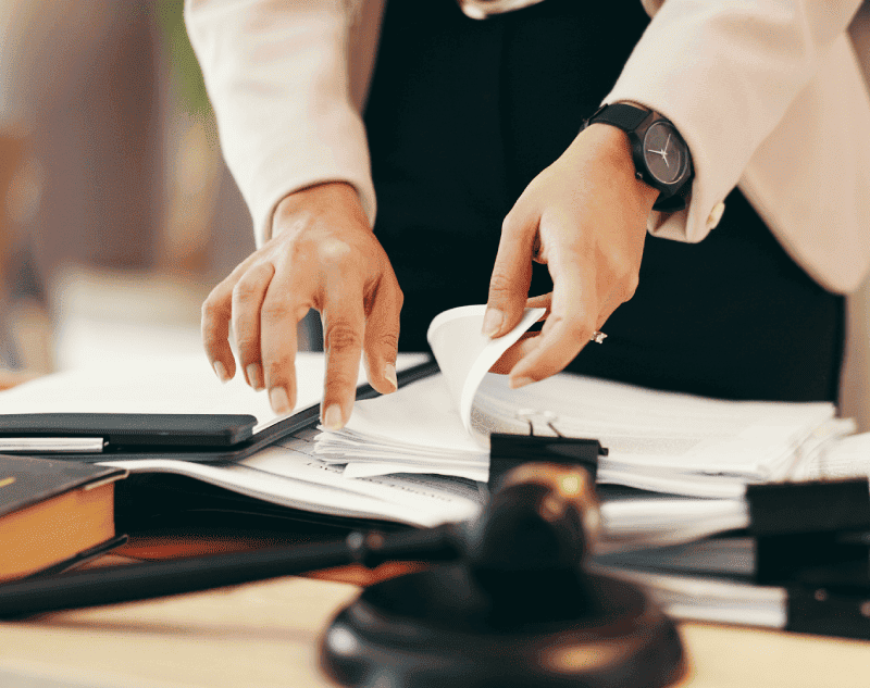 photo of lawyer going through legal documents